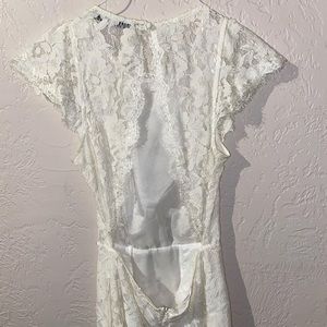 White lace open back dress